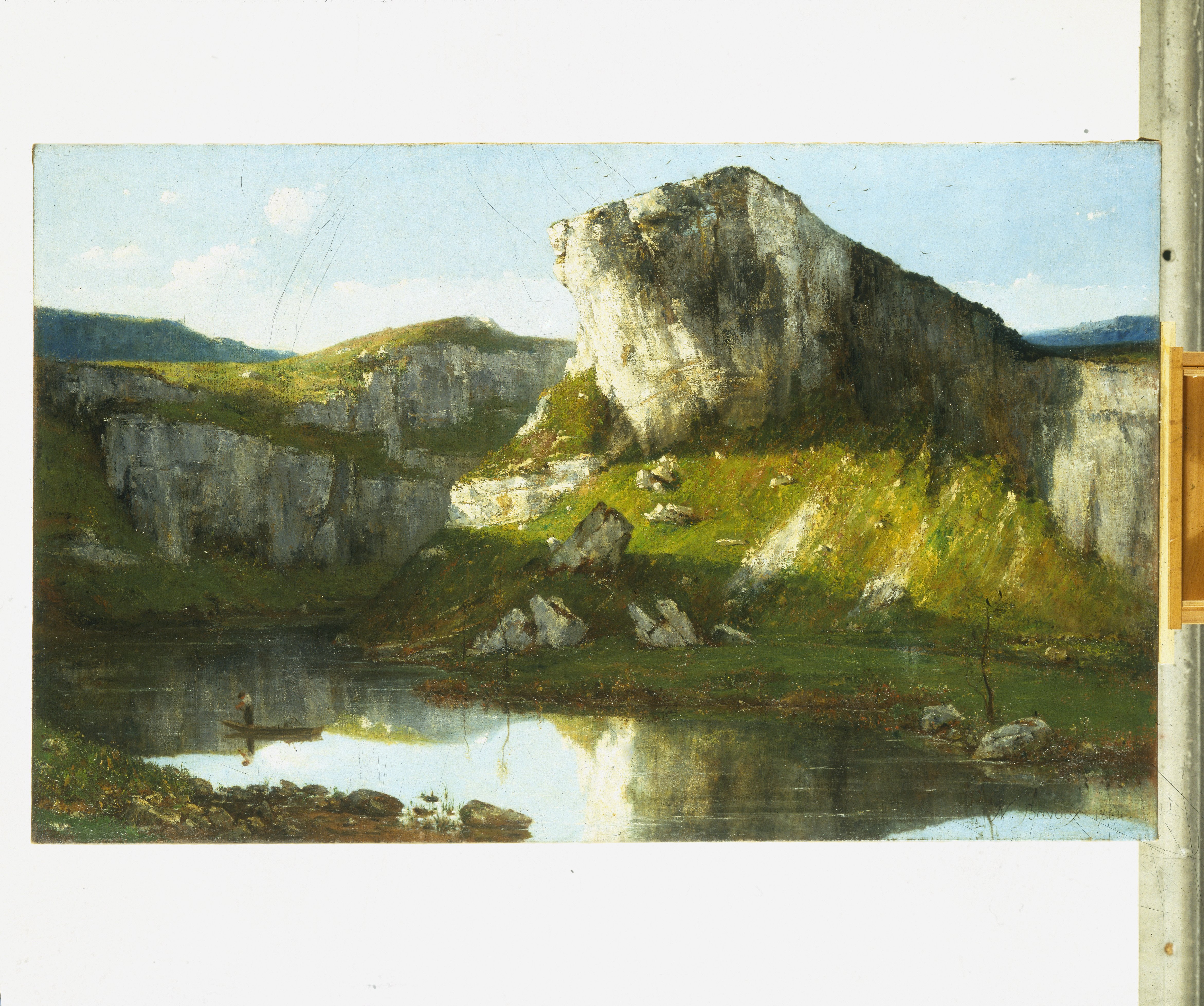 Rochers des bords du Doubs et pêcheur dans une barque